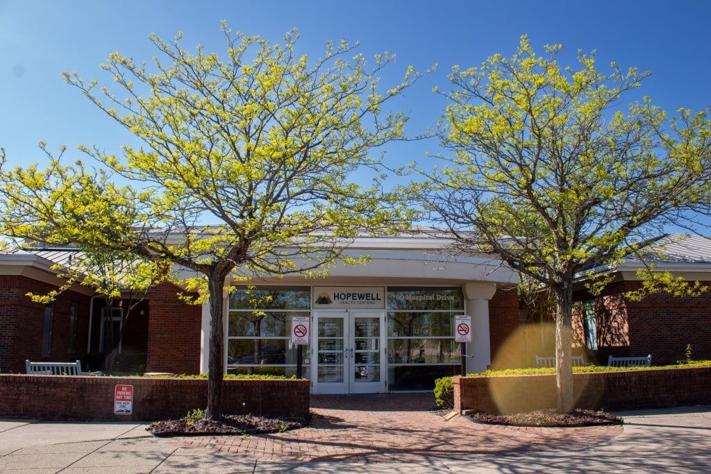 Trees bud before the Hopewell Health Centers entrance at 90 Hospital Drive in Athens.
