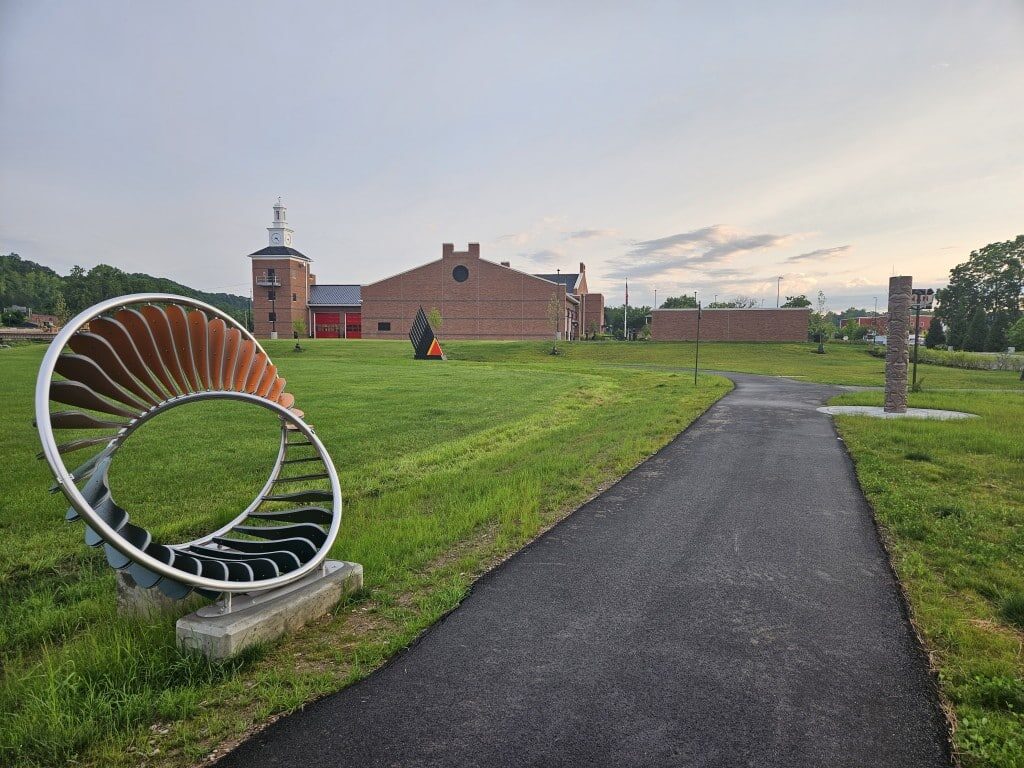Art walk with the new Stimson fire station headquarters in the background.