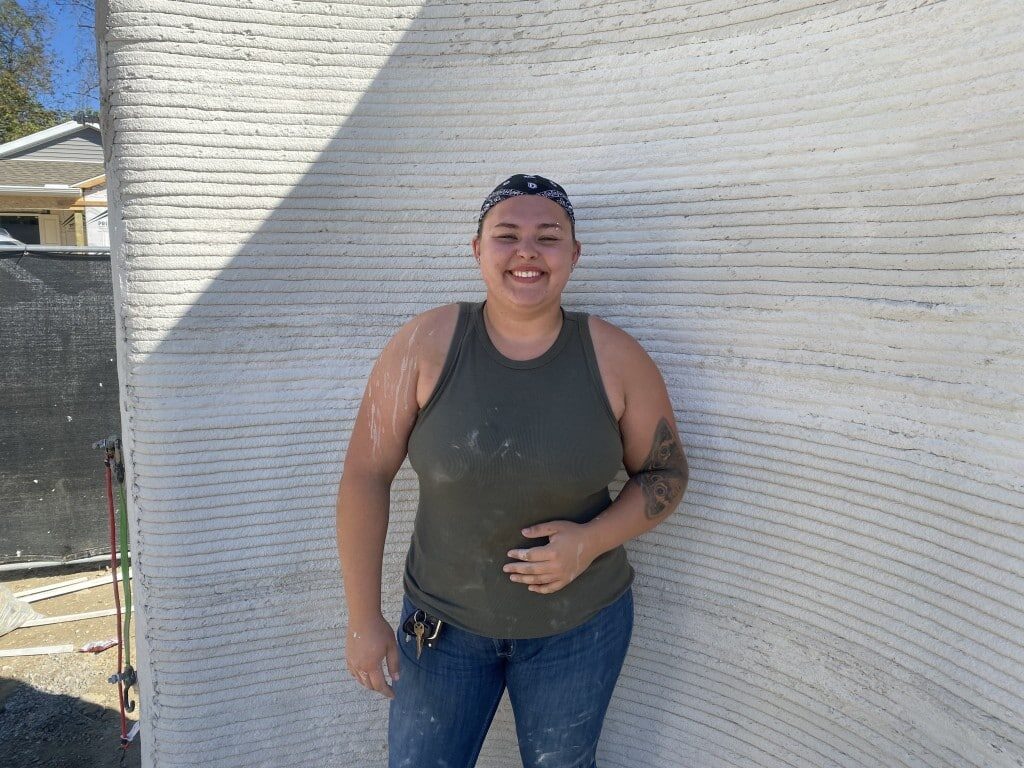 Person in front of wall