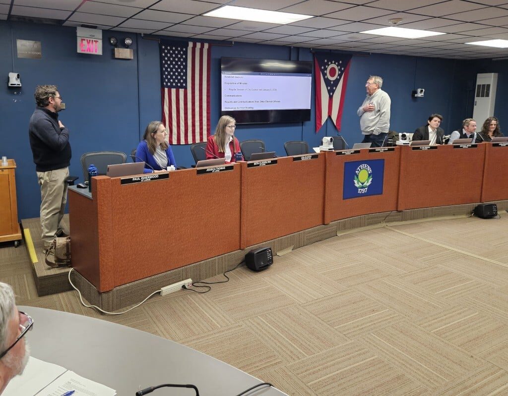 Paul Isherwood and Alan Swank saying the Pledge of Allegiance.