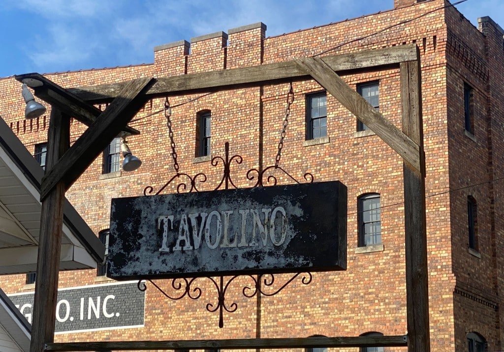 A wooden sign says Tavolino.