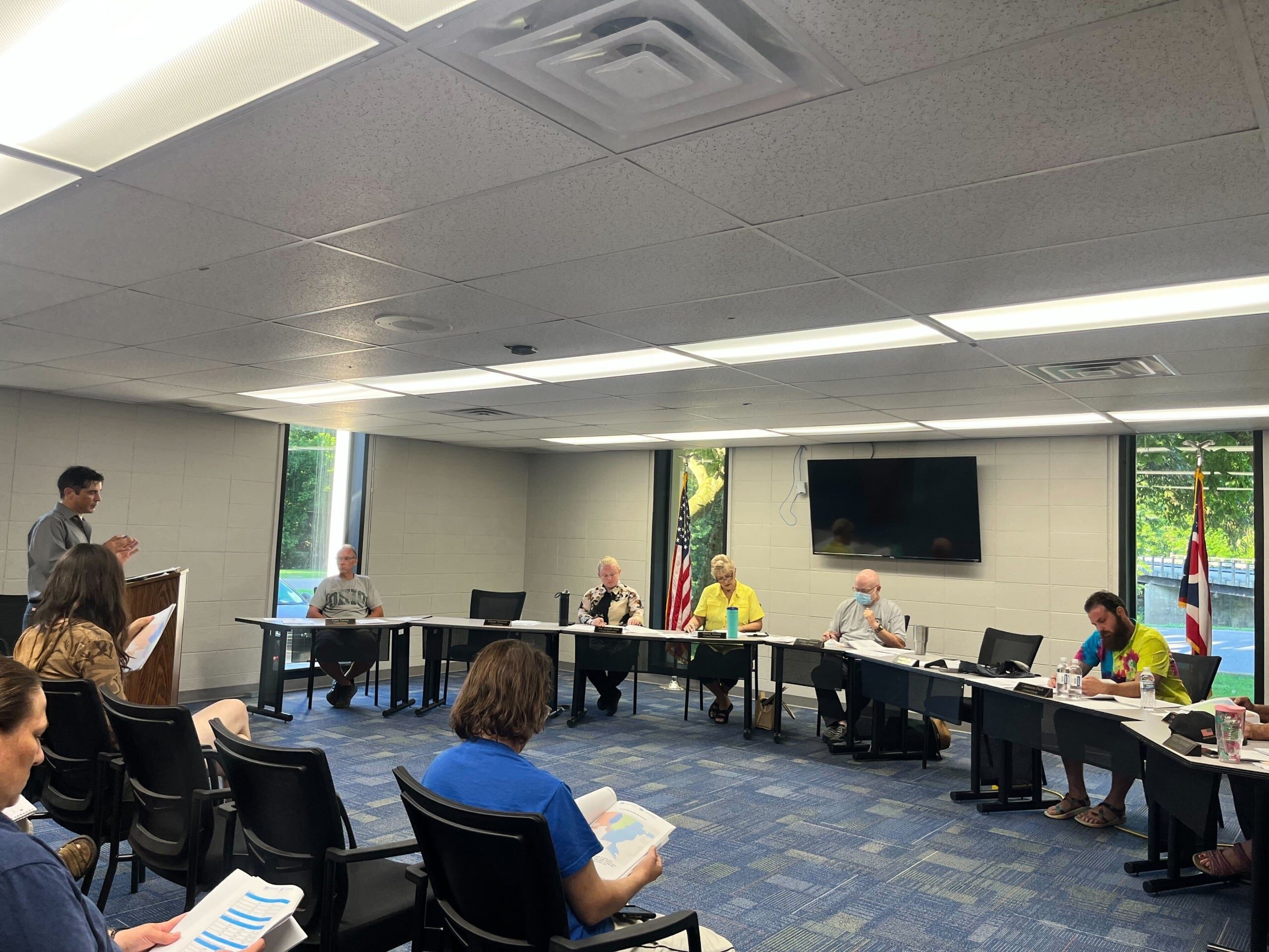 Group sitting before the city council.