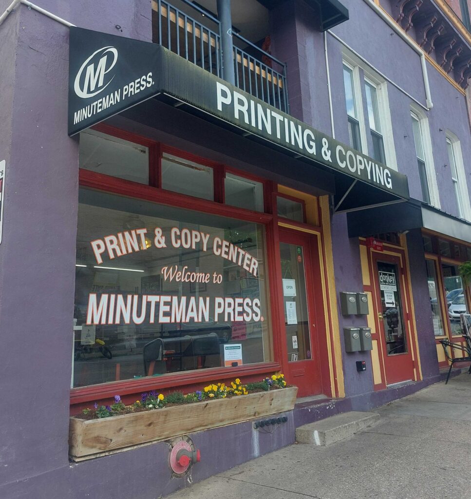 A photo of Minuteman Press of Athens storefront.