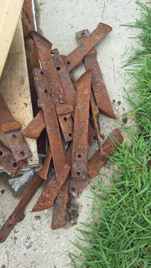 Rusty metal bars worn down to a nub.