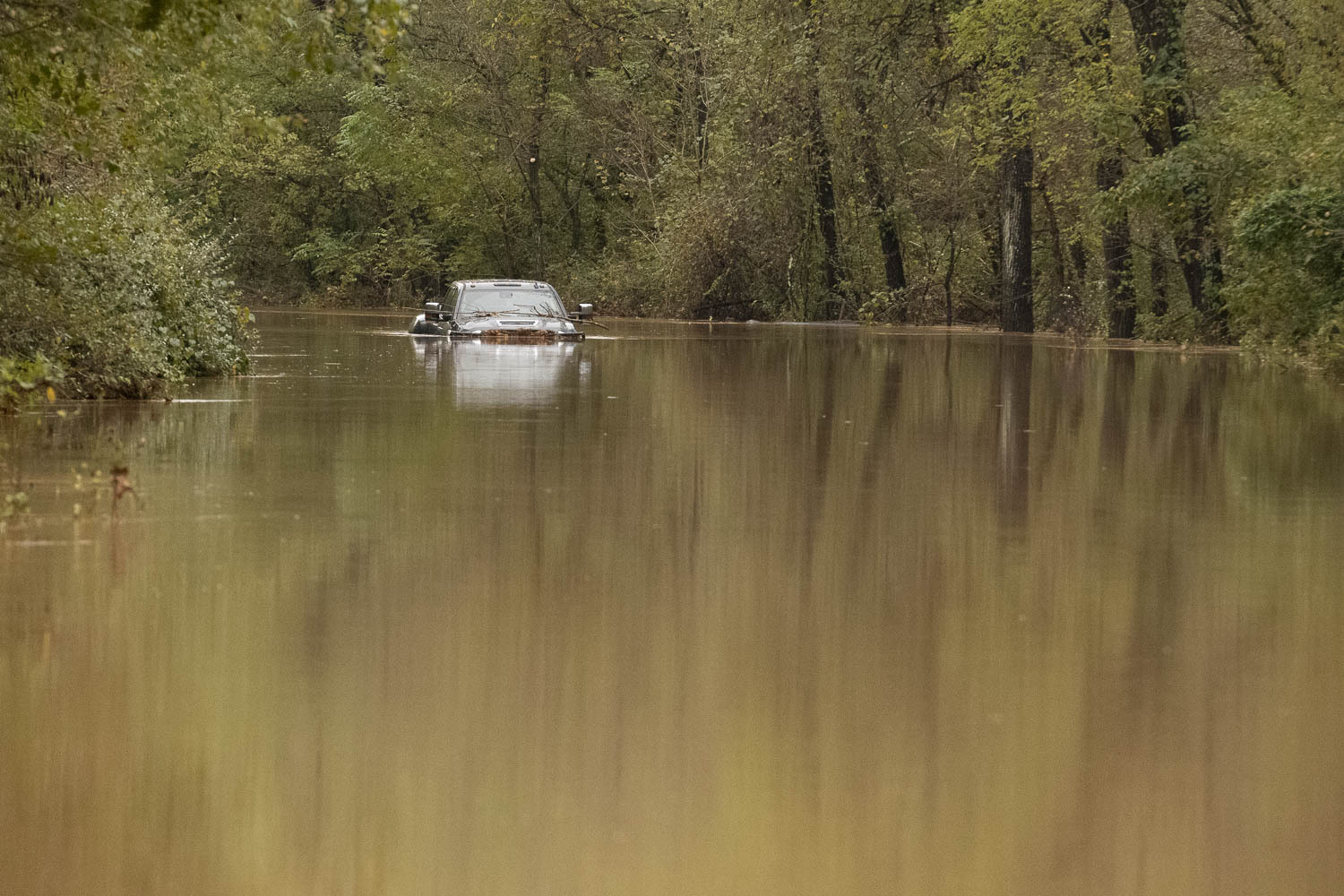 Car sticking out from floodwaters