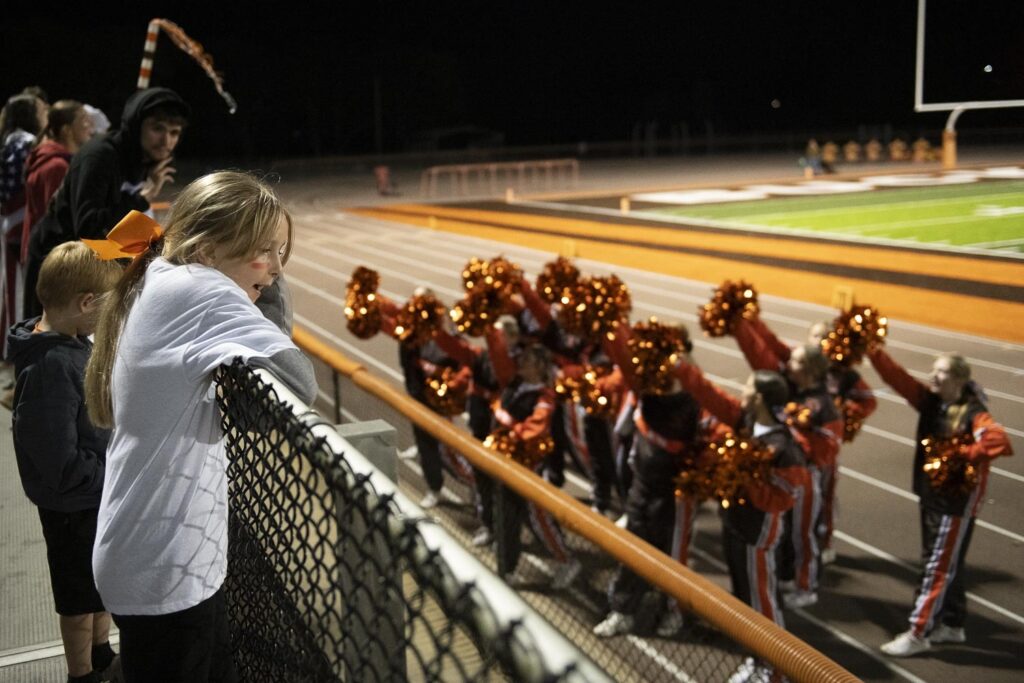 Cheerleaders with pompoms